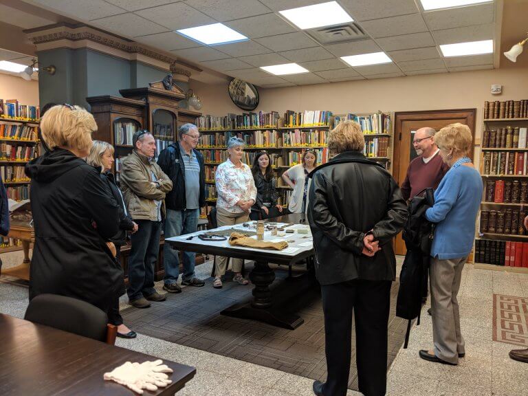 Matt Mayberry, CSPM Director, sharing some collection items as part of the Law and Disorder Walking Tour.