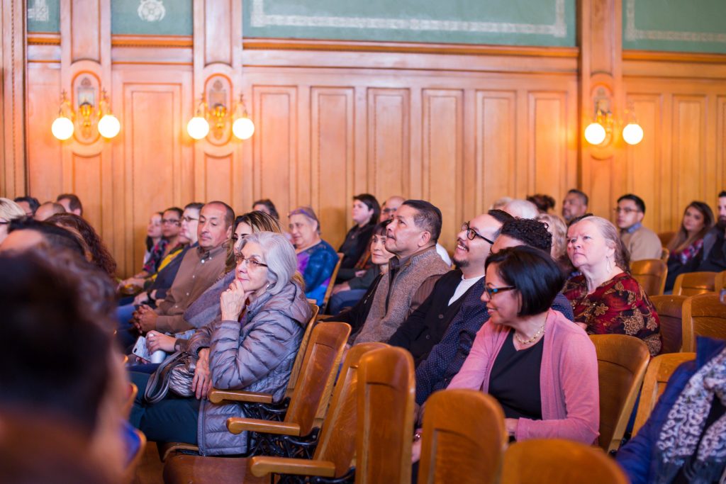 Attendees sitting in the Division 1 Courtroom.