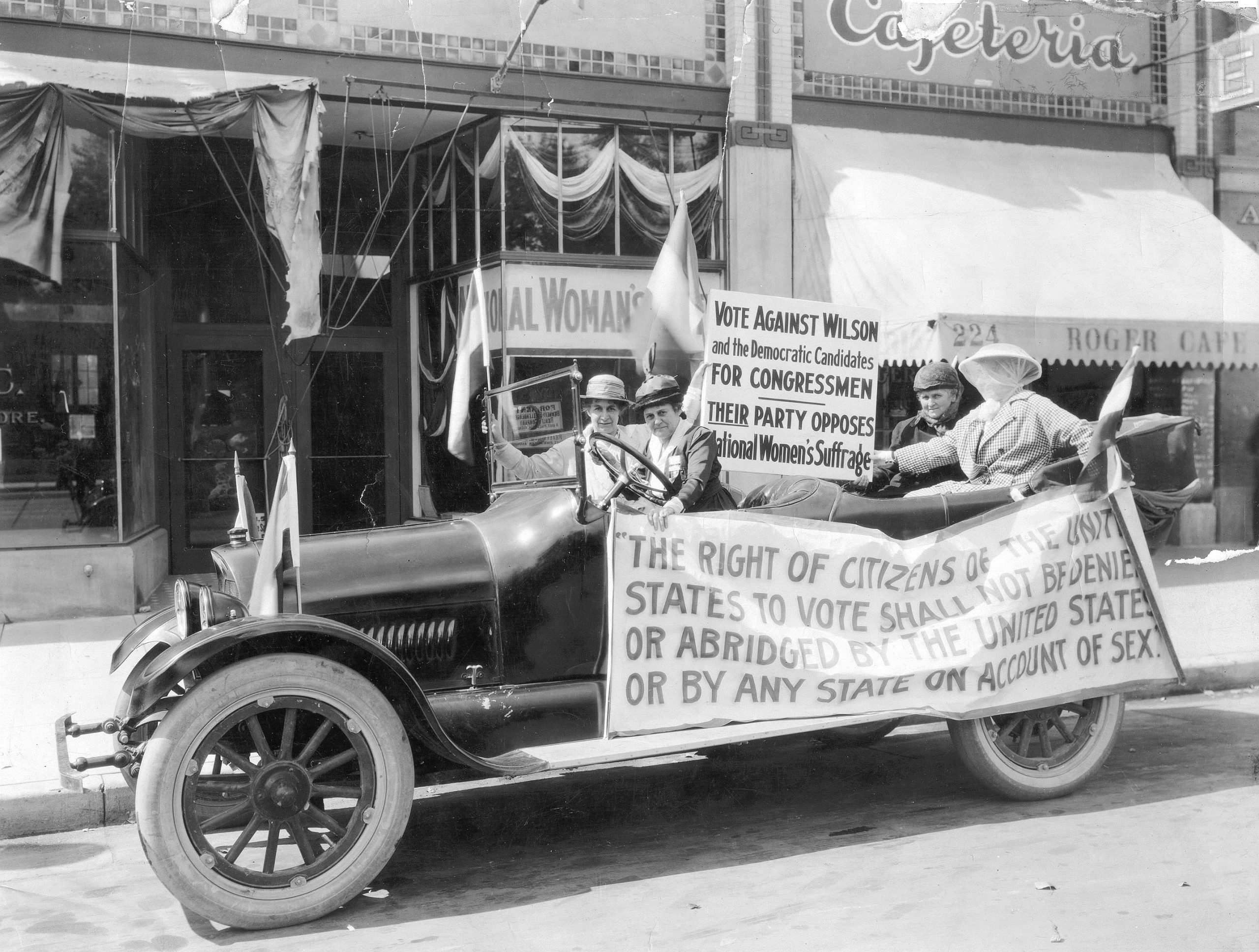 Photo of car in front of the National Women's Party Headquarters in Colorado springs