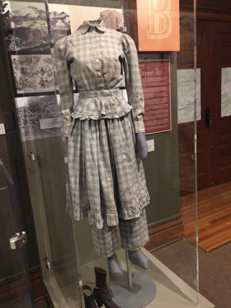 A photo of a bloomer dress on a mannequin in the Story of Us exhibit.
