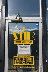 Store front of Stir with COVID-19 Sign