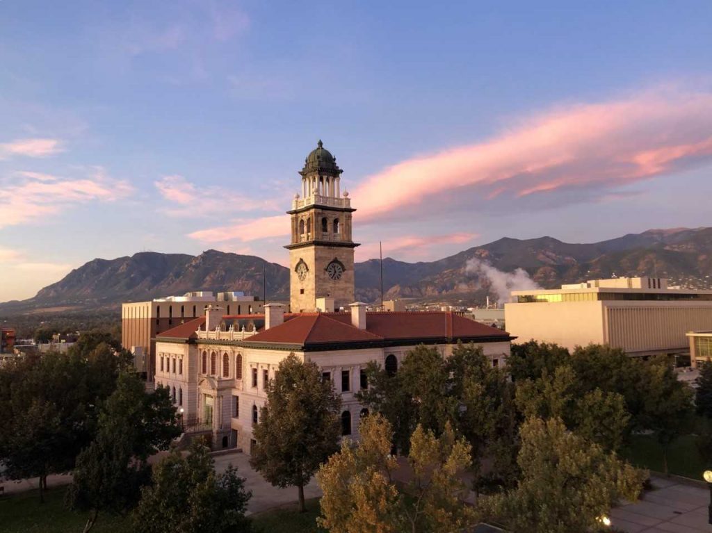 Photo of the 1903 El Paso County Courthouse, which houses the CSPM. Thie direction is looking on the south side of the building from a higher elevation during a sunrise.