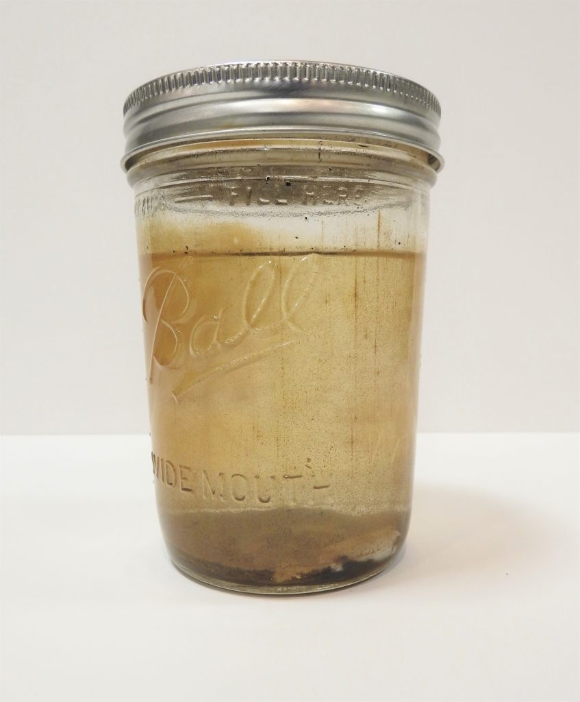 Runoff Water from Fountain Creek after Waldo Canyon Fire, 2012. Generously Donated by Joanne Meury Garrison, 2012.13.1