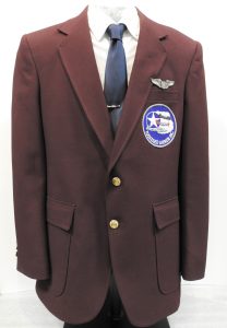 Franklin Macon’s Tuskegee Airmen Jacket, 1970, Franklin Macon’s Tuskegee Airmen Pin, ca. 1944. Generously Donated by Franklin Macon, 2019.93.1,.2.