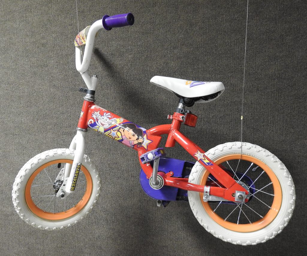 Dora the Explorer Bicycle, 2010. Generously Donated by Brier Witherow, 2020.70.9.