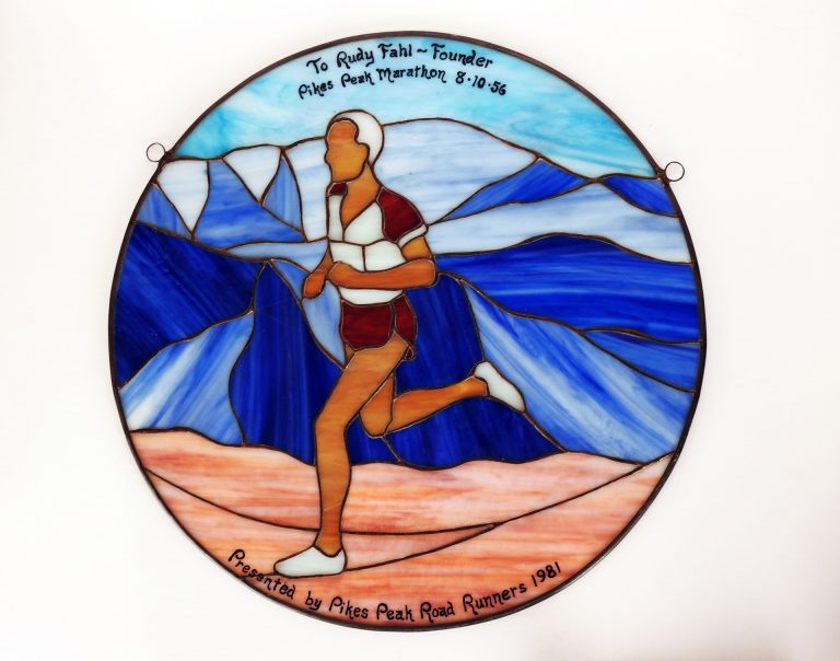 Leaded Glass Pikes Peak Marathon Runner, 1981. CSPM Collection, PM-88-145