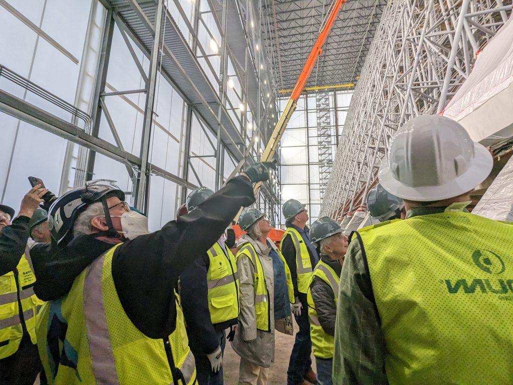 Marty Rickett, LEED-AP Sr. Project Manager of JE Dunn Construction points out the current construction process.