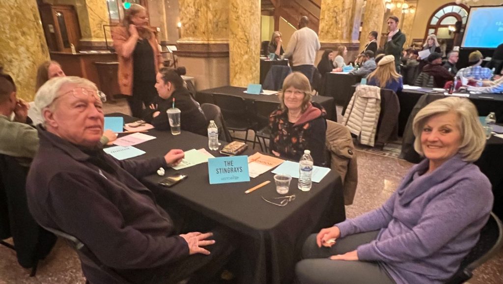 Linda (far right) and her husband (far left) Ed competed as part of the Stingrays group at the CSPM’s inaugural History Happy Hour Trivia Night in 2022.