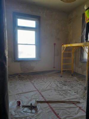 Removal of plaster in Southwest storage.