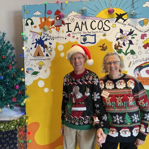 Ruby and Ted Lindeson volunteering as greeters at the Festival of Lights Open House.