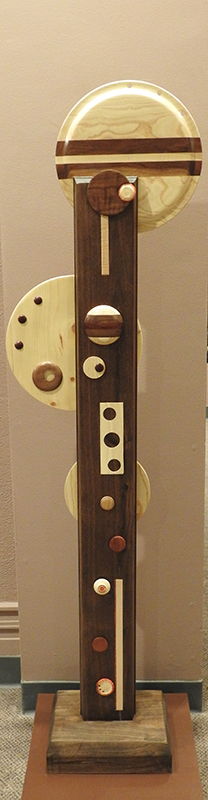 Wooden abstract totem sculpture.