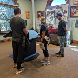 CSPM volunteer leads museum guests in gallery