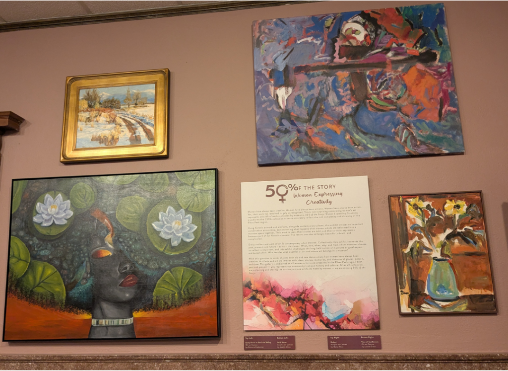 The Title wall includes four paintings and a description of the exhibit from the curator.